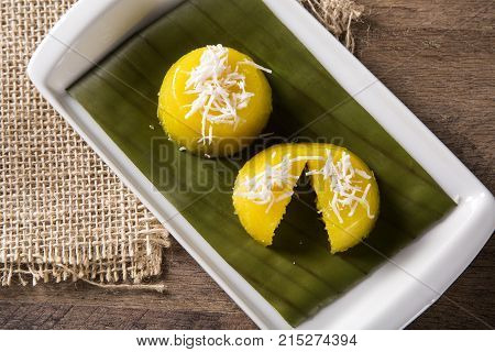 Vegan quindim dessert in wooden background. Gourmet food.