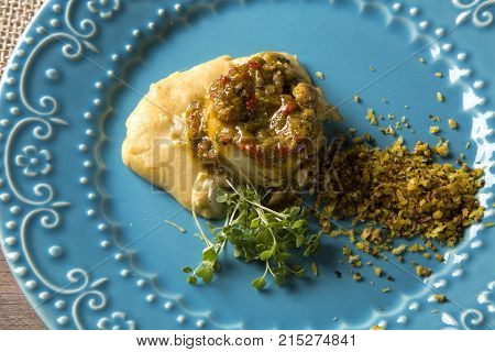 Linguado Fish With Mashed Banana From The Ground And Farofa
