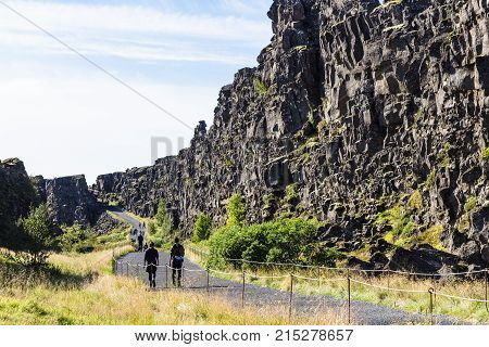 Visitors Walk To Almannagja Fault In Thingvellir