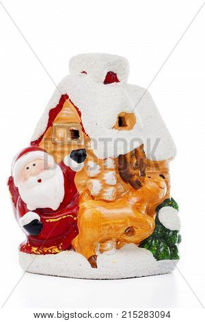 Santa Claus Christmas decoration.. Christmas figurine on isolated white background. Studio photo. Cute.