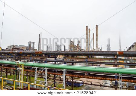 View of the petrochemical factory. Pipelines columns. Refinery.