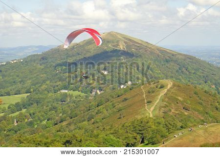 Paraglider flying above the Malvern Hills in Worcestershire