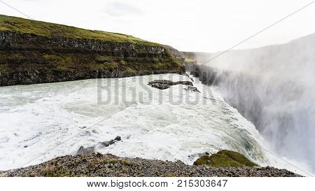 Flow Of Gullfoss Waterfall And Spray Over Canyon