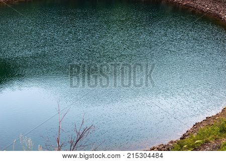 Green Water Of Kerid Lake In Volcanic Crater