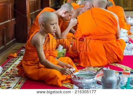 Novice And Monks In Merit Making