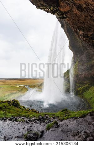 Wet Path Inside Of Seljalandsfoss Waterfall