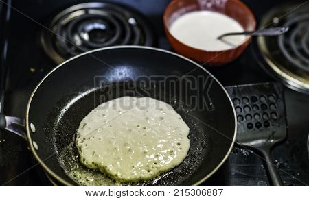 A View of Pancakes Being Made From Overhead
