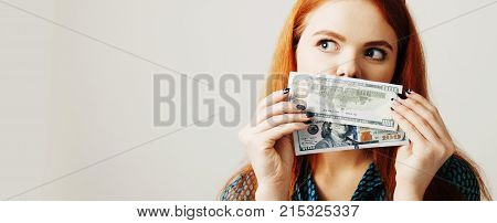 Business Woman Covering Her Mouth With A Dollar Banknote As Symbol Of As A Symbol Of Bribery Cheatin
