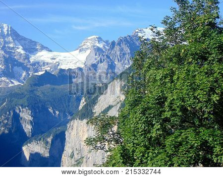 A mountain scene with a glassier between the two mountain
peaks in Switzerland.