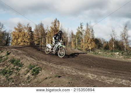 Motocross Rider On Race Track