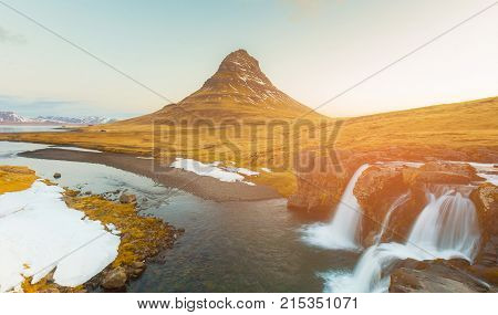 Icelandic Volcano with strem waterfall natural landscape background