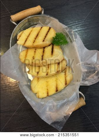 Hot garlic bread ready to serve on the table