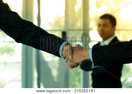 Businessmen Shake Hands And Finish Meeting In Daylight.
