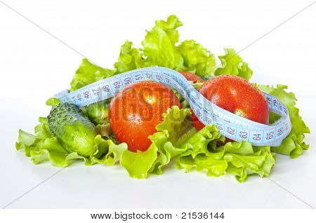Verduras con cinta métrica
