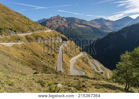 Mountains peaks and trees landscape natural environment. Timmelsjoch High Alpine Road. Passo del Rombo the highest pass of the Eastern Alps. Ötztal valley Tyrol Austria Europe