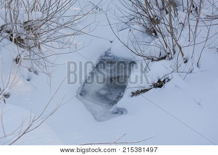 Winter Stream. Small Taiga River In The Winter.