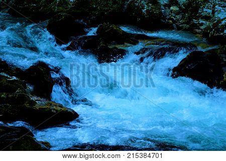 Radovna river rapids and dark rocks in the Vintgar Gorge Slovenia