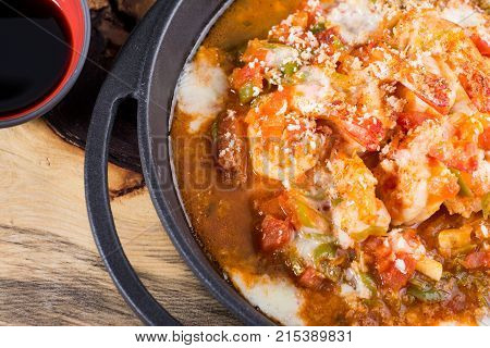 fresh shrimps casserole served with hot spices