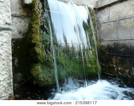 Waterfalls in the mountains of the North Caucasus surrounded by beautiful autumn nature