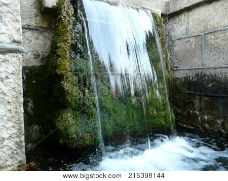 Waterfalls in the mountains of the North Caucasus surrounded by beautiful autumn nature