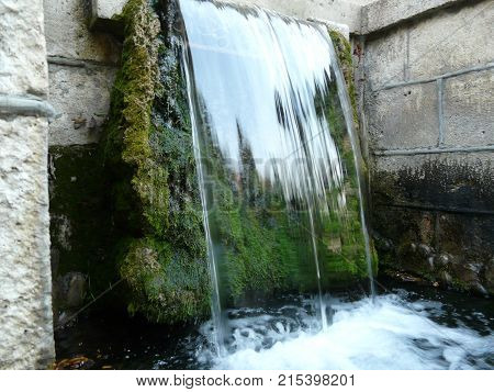 Waterfalls in the mountains of the North Caucasus surrounded by beautiful autumn nature