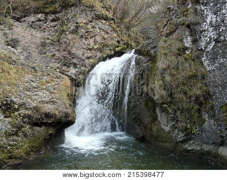 Waterfalls in the mountains of the North Caucasus surrounded by beautiful autumn nature