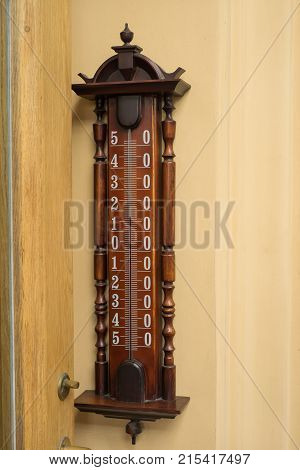big external thermometer on a wall closeup.