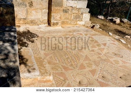 Beautiful and colorful Roman Mosaics Ruins at Ancient Byzantine Church in Jordan