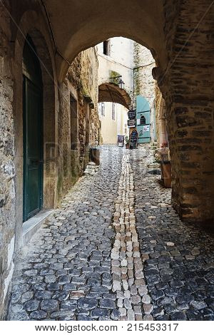 Aubenas France September 18 2016: Restaurant in a narrow street of the village Saint Montan in the Ardeche region of France