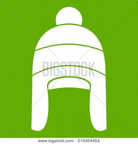 Winter hat icon white isolated on green background. Vector illustration