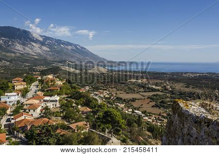Panoramic view of the coasts of the island of Kefalonia at the height of the beach of Lourdes from the ancient castle of Agios Georgios