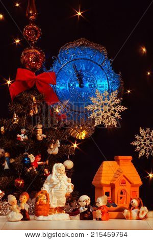 Postcard with New Year's greetings from Santa Claus and a cheerful family