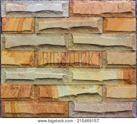 Stone wall texture, travertine tiles facing stone background