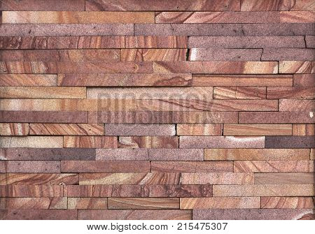 Stone wall texture, travertine tiles facing stone background