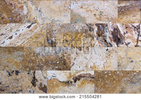 Facing tile from travertine with a smooth surface texture