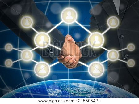 Business handshake with Social media symbol over the world map background Elements of this image furnished Business social netwok concept