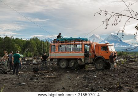 Kamchatka Peninsula, Russia - August 20, 2016: Gathering of the tourist campground on the shore of river Studenaya. Kamchatka Peninsula.