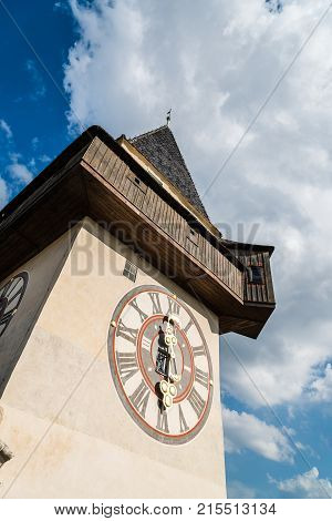 Graz, Austria - August 11, 2017: Low angle view of Uhrturm clock tower in Graz against sky