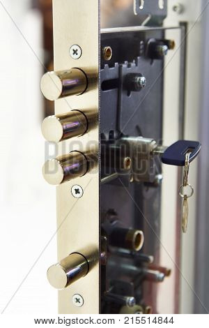 The pin tumbler lock with key closeup
