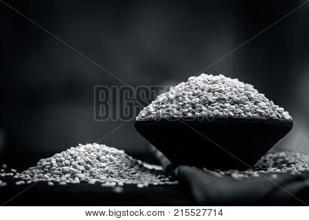 Vigna mungo, urad, Split Black gram, in a clay bowl.