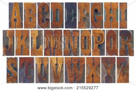 alphabet set in vintage letterpress wood type blocks, French Clarendon font popular in western movies and memorabilia, a collage of 26 isolated letters with a digital painting filter applied