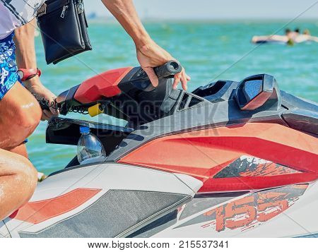 Rudder of a water motorcycle on a beach close up