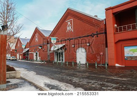 Hakodate Hokkaido-14 February 2017: Hakodate Kanemori Red Brick Warehouses the first commercial warehouse Hakodate Japan cityscape at the historic Red Brick Warehouses and Mt. Hakodate.