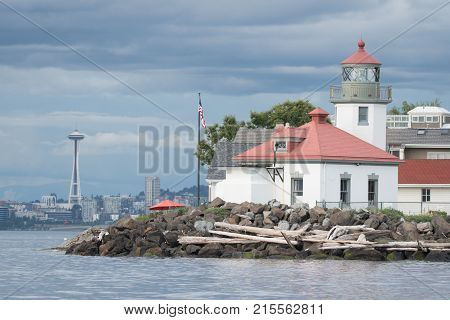 Seattle's Alki Point Lighthouse taken from the water on a flat lit day