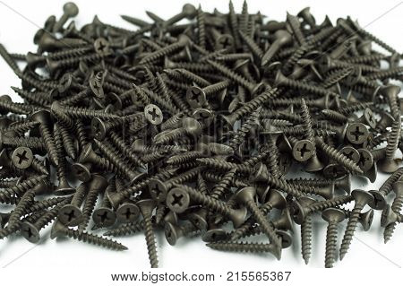 self tapping metal screw with hex head on a white background