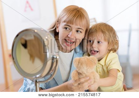 Cute child little boy at speech therapist office