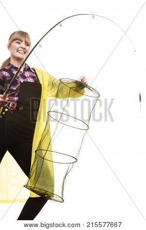 Happy Woman Holding Fishing Rod And Keepnet
