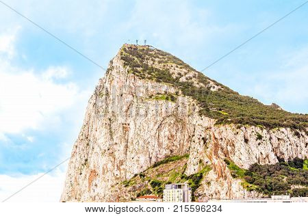 Rock of Gibraltar on the blue sky background. Veiw Gibraltar Rock closeup