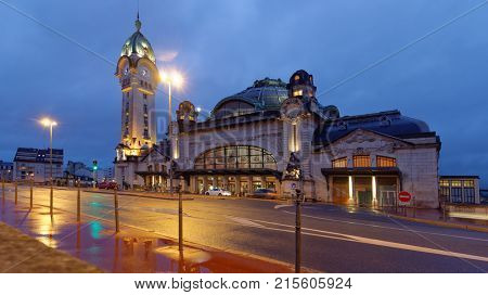 LIMOGES, FRANCE - SEPTEMBER 9, 2013: Night view of Limoges-Benedictins Train Station. Built in 1929, it's considered as one of the most beautiful train station in the world