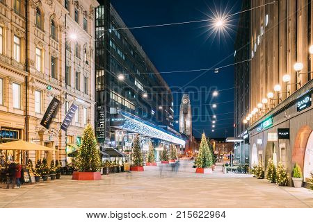 Helsinki, Finland - December 6, 2016: Night View Of Keskuskatu Street In Evening Christmas New Year Xmas Festive Illumination. Kauppakeskus Citycenter And Helsinki Central Railway Station